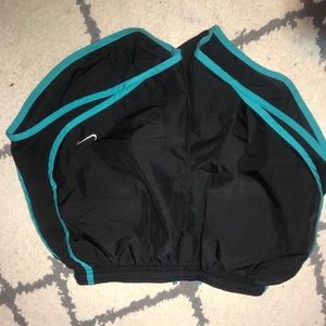 teal and black nike shorts
